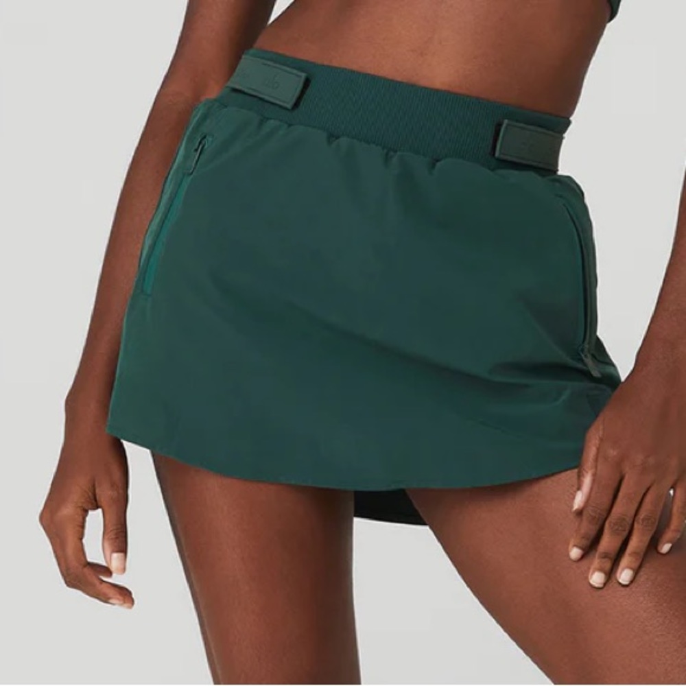 Alo high waisted elevation mini skirt in a size xs